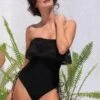 Black W/ Crochet Ruffle Luxury One Piece Swimsuit 1 Black W/ Crochet Ruffle Luxury One Piece Swimsuit -Swim Luxe Outfit jolidon apparel accessories clothing swimwear black w crochet ruffle luxury one piece swimsuit black w crochet ruffle luxury one piece swimsuit jolidon 2492 shop now 28023507812450 1